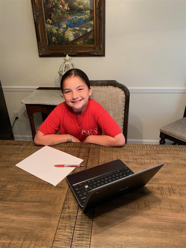 student at home on laptop